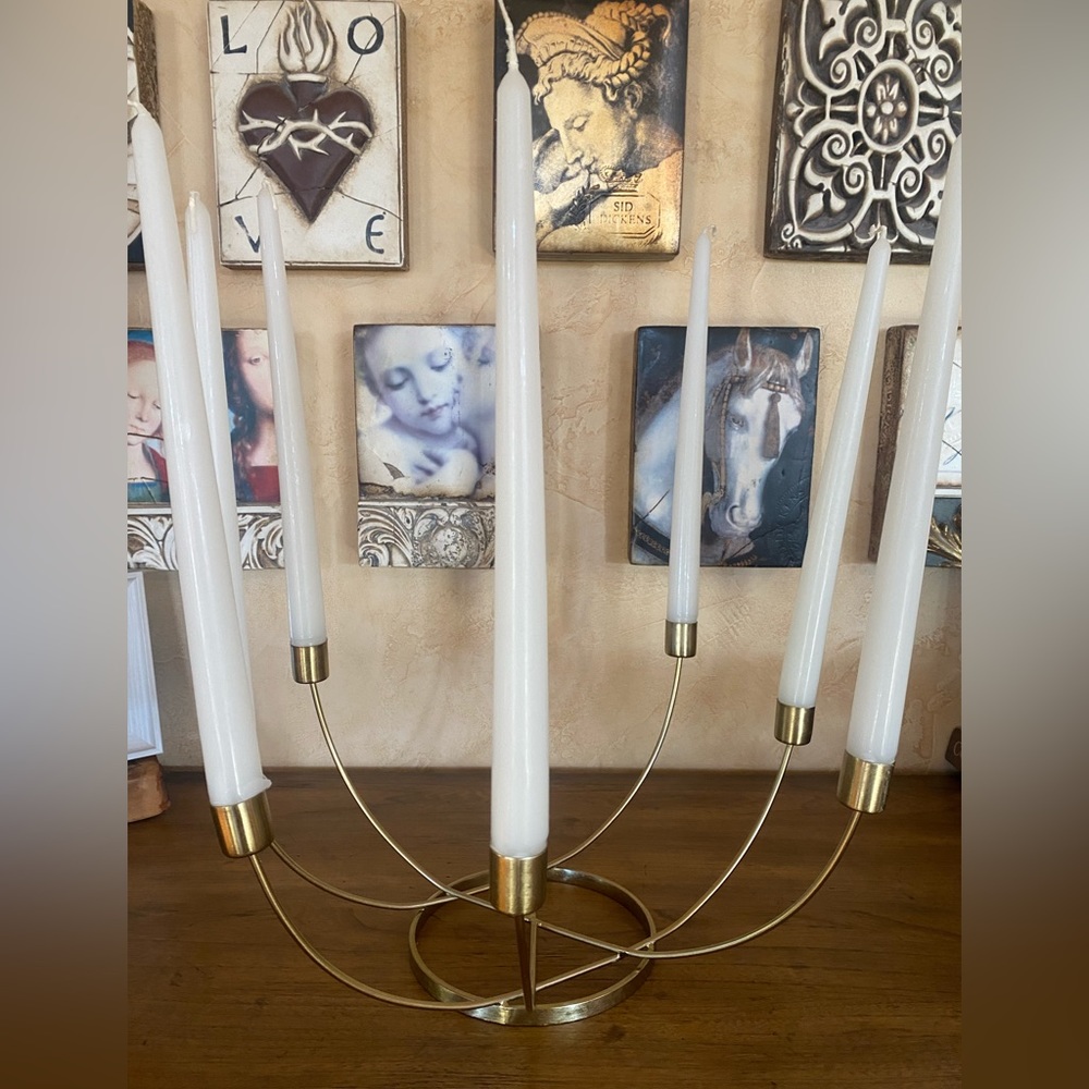 8 prong brass candle stick holder.  Rare large size comes with candles.